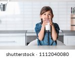 Cute little girl drinking milk...
