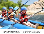 Little Children Kayaking On...