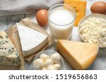 Different delicious dairy products on table, closeup