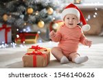 Little Baby Wearing Santa Hat...
