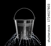 Small photo of Leaky bucket with water on black background