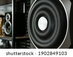 Modern powerful subwoofer indoors, closeup. Audio speaker system