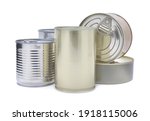 Many closed tin cans on white background