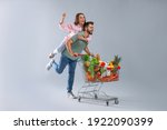 Young Couple With Shopping Cart ...