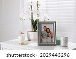 Framed Family Photo And Orchid...