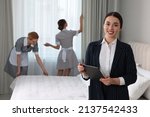 Housekeeping manager with tablet checking maid's work in hotel bedroom