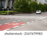 Bike path and pedestrian crosswalk in city
