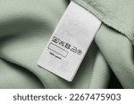 Clothing label on light green...