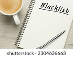 Small photo of Word Blacklist written in notepad and coffee on wooden background, flat lay