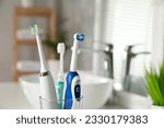Electric toothbrushes in glass...