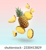 Small photo of Fresh whole and cut pineapples falling on colorful background