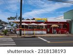 Small photo of KAUAI, HI, U.S.A. - MAY 3, 2023: Street photo of Lana's Cafe, a typical small restaurant business in Kapa'a selling Hawaiian shave ice, smoothies and coconuts.