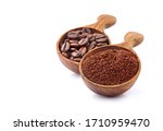 Coffee beans and ground coffee in wooden spoon on white background. Coffee   beans isolated.