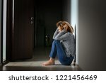 Woman having panic attack indoors