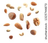 Falling Nuts On White Background