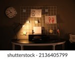 Small photo of Interior of modern FBI agent's office at night