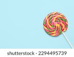 Colorful lollipop on blue background