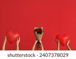 Women with heart-shaped balloons and roses on red background. Valentine's Day celebration