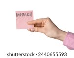 Small photo of Woman holding piece of paper with word IMPEACH on white background