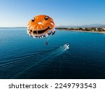 Parasailing in the clear blue...