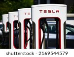 Small photo of Bispingen, Germany - June 16, 2022: Tesla Supercharger Station near Bispingen, Germany - Tesla is an American electic vehicle and clean energy company