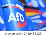 Small photo of Burgdorf, Lower Saxony, Germany - June 30, 2023: Paper flags with the logo of the right-wing political party Alternative for Germany, AfD
