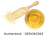 Sesame Oil With Seeds Isolated...