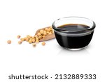 Soy sauce in glass bowl with soybeans isolated on white background. 