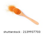 Small photo of Turmeric powder (Tumeric curcumin, Curcuma longa linn) in wooden spoon isolated on white background. Top view. Flat lay.