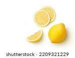 Small photo of Whole and half sliced lemon isolated on white background. Top view. Flat lay.