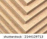 Raw MDF in the shape of stepped triangles, close-up.