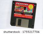 Small photo of United Kingdom - June 13 2020: 3.5 inch floppy disk from a 90's PCGames magazine containing shareware
