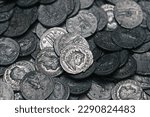 Ancient Roman silver coins on full background. Archaeological treasure (concepts, collecting, riches)