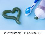 heart symbol from toothpaste.... | Shutterstock . vector #1166885716