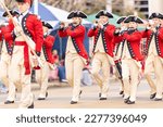 Small photo of Laredo, Texas, USA - February 19, 2022: The Anheuser-Busch Washington’s Birthday Parade, The Old Guard's Fife and Drum Corps is known for its red coats and tricorn hats