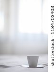 close up of coffee cup and... | Shutterstock . vector #1184703403