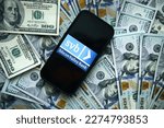 Small photo of Berlin,Germany - March 14,2023: Silicon Valley Bank logo with dollar background.One of the largest banks in the USA went bankrupt.