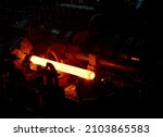 glowing steel tube during production in a modern rolling mill in the industry 