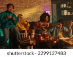 Small photo of A group of cheerful friends are in a retro styled living room, wearing fashionable clothes and enjoying takeout food.