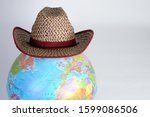 Cowboy hat on the globe  travel ...