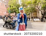 Small photo of Manhattan, 5th Avenue, New York City USA: November 11, 2021: Annual Veteran's Day Parade is back in New York with big celebration, Uncle Sam