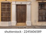 Small photo of Cartagena, Columbia - January 2, 2023: Cartagena`s elaborate door knockers date back to colonial times. A saying in Spain at the time was “A tal casa tal aldaba”, or “To each house its door knocker".