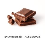 Macro photo  of Chocolate bar. Broken pieces over white background