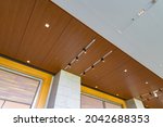 Wooden ceiling with spotlights and downlights