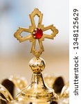Golden Cross With Red Stone....