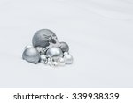 Outdoor silver grey decorative Christmas ornaments with animal Santa Claus's reindeer at natural snow background