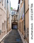 Small photo of Old Town street architecture during the Avignon Festival Off. Avignona??s history is one of acrimony.