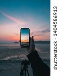 The Photo Of Sunset On A Mobile ...