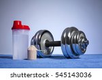 dumbbell and whey protein... | Shutterstock . vector #545143036