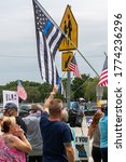 Small photo of Parkland, Florida, USA - July 11, 2020: Back The Blue Event at Parkland, Florida. unwavering support for the brave men and women of law enforcement. Law Enforcement and Trump Supporters.
